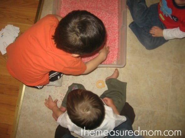 children with box of rice
