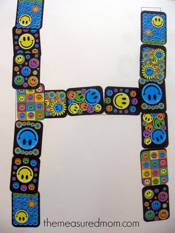 letter H made with happy face stickers