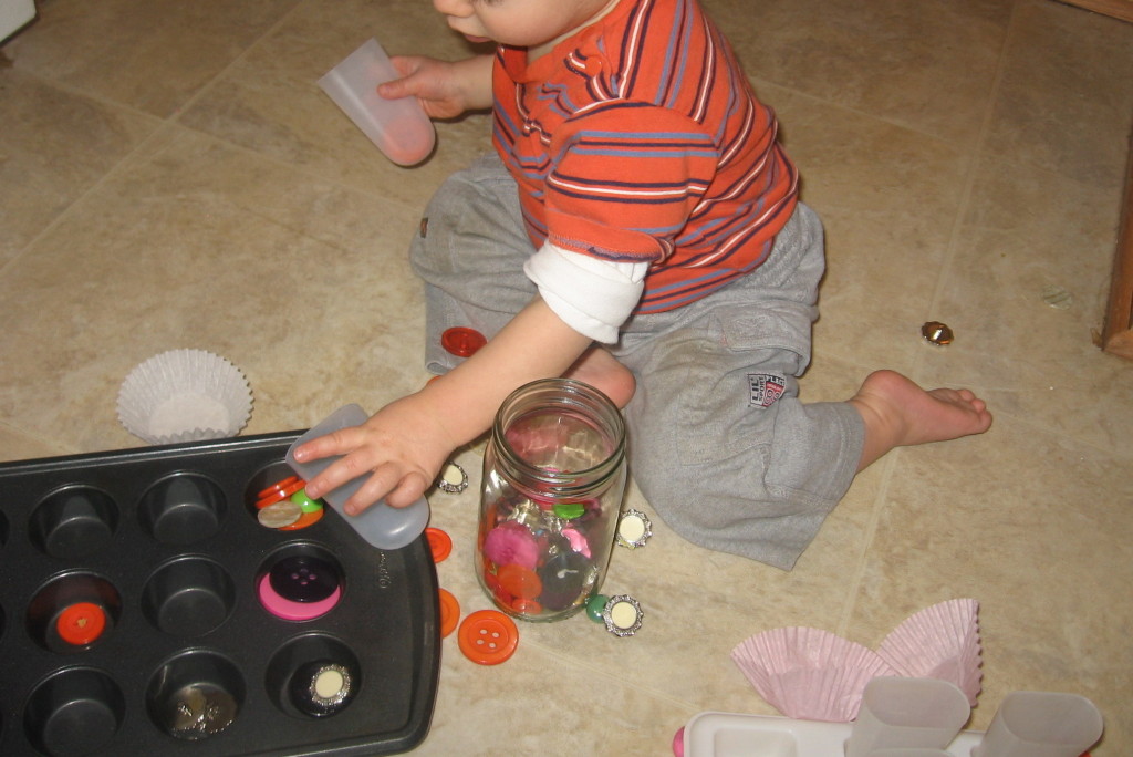child playing with buttons