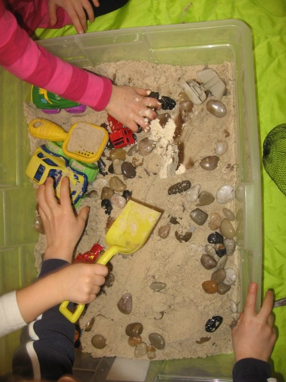 children playing with sandbox