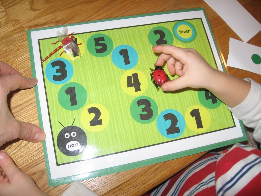 child playing buggy board game