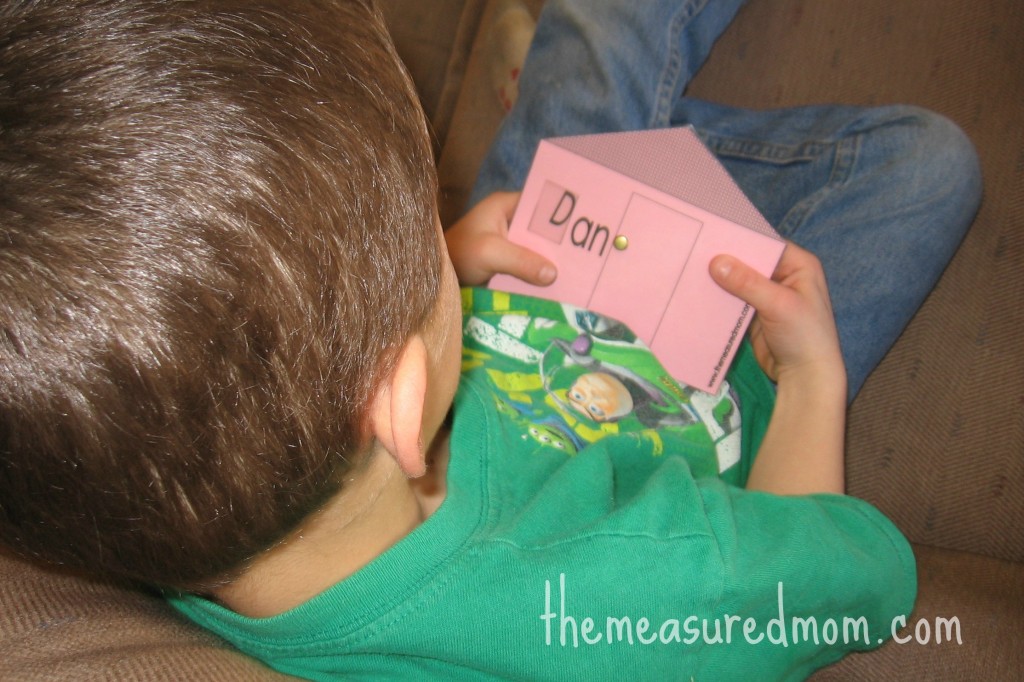 child reading with word family house
