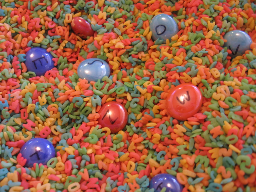 gems in colored alphabet pasta