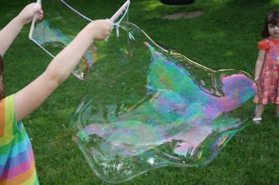 Bubbles make a great outdoor play activity! Here are seven fun ways to create and play with them. 