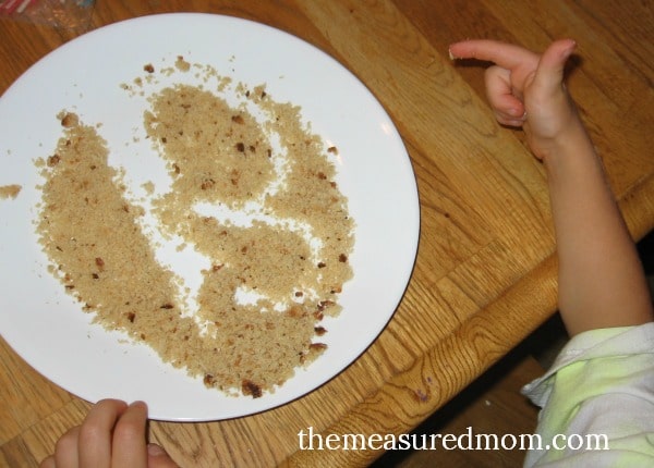 handwriting practice with bread crumbs