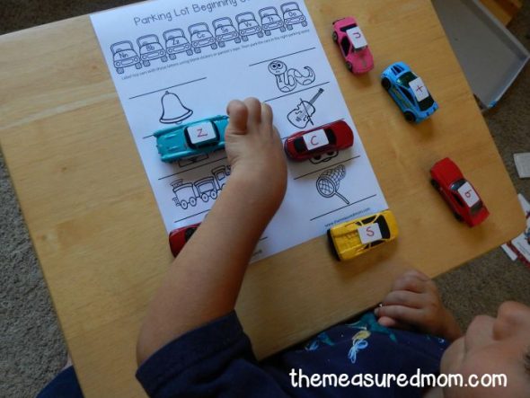 Check out this FREE beginning sounds activity for preschool and kindergarten! Print one of ten free parking lots and park the cars in the correct spots. My preschooler loves it!