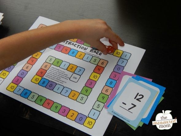 child playing subtraction game